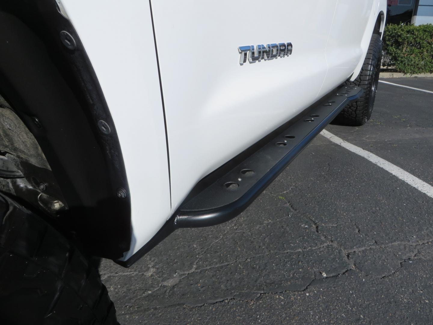 2020 White /GREY Toyota Tundra SR5 (5TFDY5F19LX) with an 5.7L engine, automatic transmission, located at 2630 Grass Valley Highway, Auburn, CA, 95603, (530) 508-5100, 38.937893, -121.095482 - Features - King Off Road adjustable remote reservoir coil overs, King 2.5 adjustable remote reservoir rear shocks, Method Race wheels, Falken Wildpeak tires, Sliders, Bed braces, Borla Exhaust, Husky floor mats, Window tint, and Ram phone mounts. - Photo#11